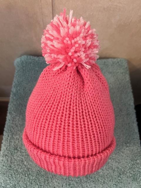 Small Adult Pink Handmade Knitted Winter Hat with handmade pink & white pom pom